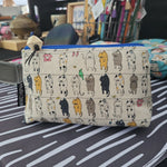 cats on a line SM. Olivia Triangle Pouch