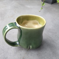 Body green Mug 12/23