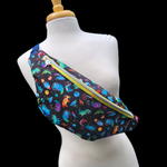 Astro Dino, one zipper fanny/sling