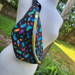 Space Dinos, one zipper fanny/sling