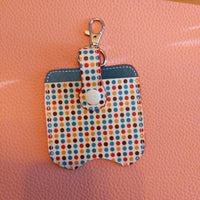 Dots Sanitizer Bottle and Holder