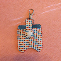 Dots Sanitizer Bottle and Holder