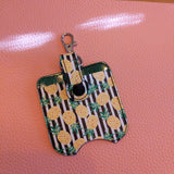 Pineapples/Stripes Sanitizer Bottle and Holder