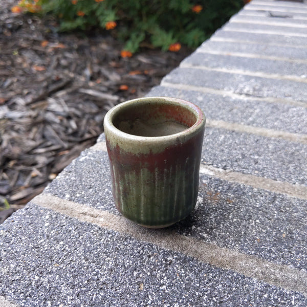 green/rust cup