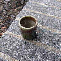 green/rust cup