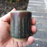 green/rust cup