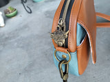 COOS/brown/blue Vinyl, itty bitty Bowler Bag