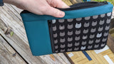 Cat & Lagoon Sileather Zippy Clutch