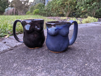 Female form, blue glaze Mug